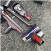 Image 5 : DYSON V15 TOTAL CLEAN CORDLESS STICK VACUUM WITH CHARGER AND ACCESSORIES WORKING