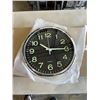 Image 3 : 3 NEW 12 INCH WALL CLOCKS. TWO ARE BLACK WITH A CHROME FINISH. ONE IS BLACK WITH A WHITE FINISH