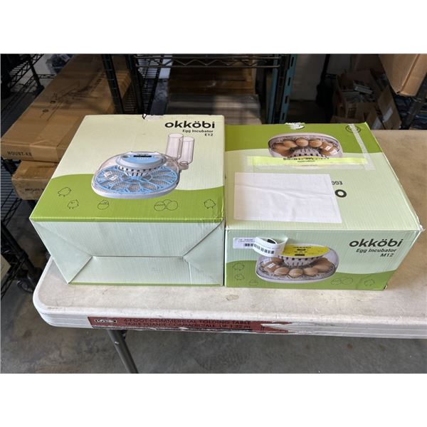 2 NEW OKKOBI EGG INCUBATORS. M12 AND E 12
