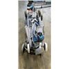 Image 1 : 4 SHOPPING CARTS AND BABY STROLLER