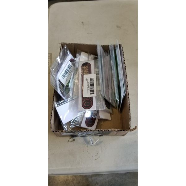 TRAY OF "SMILE, YOUR ON CAMERA" AND RECYCLING STICKERS