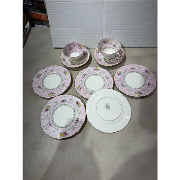 Paragon teacup saucers inside plate