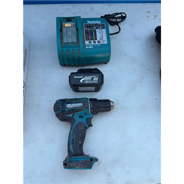 Makita drill, battery and charger