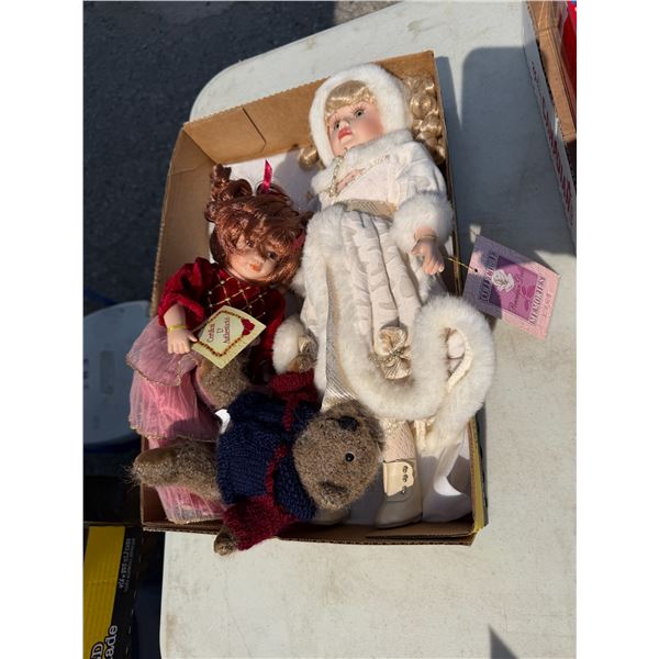 Porcelain dolls and teddy bear