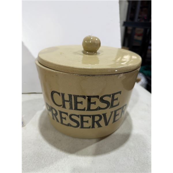Pottery cheese preserver is cracked