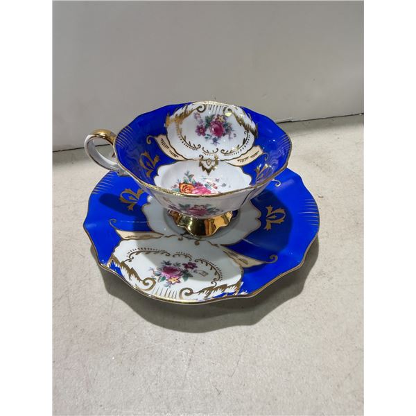 Hand painted in Japan, tea cup, and saucer