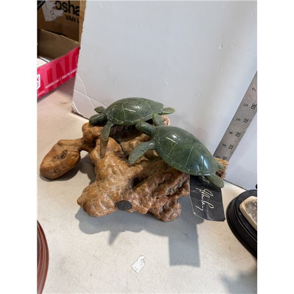 John Perry sculpture turtle has a broken leg
