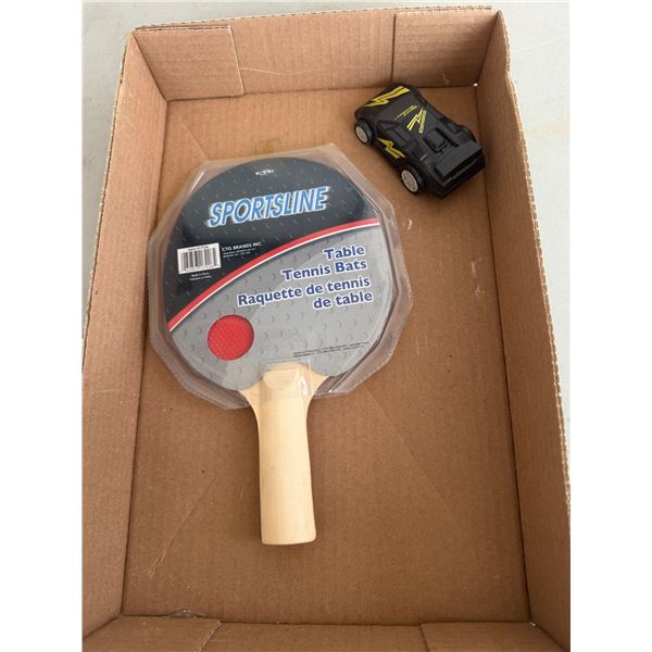 Table, tennis bracket and a car