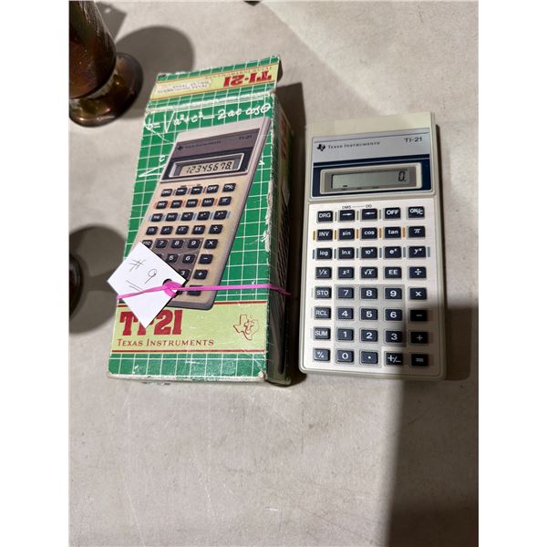 1982 Texas Instruments TI-21 calculator with instructions works