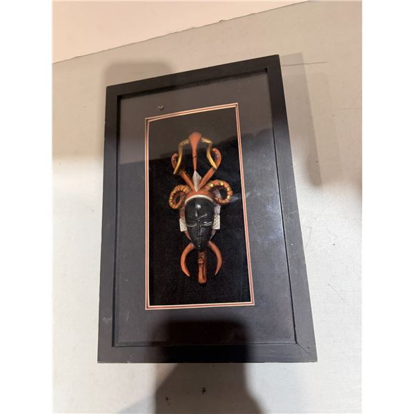 Carved wall hanging