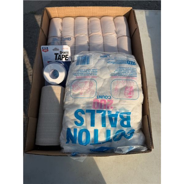 Tensor bandages and cotton balls and sports tape
