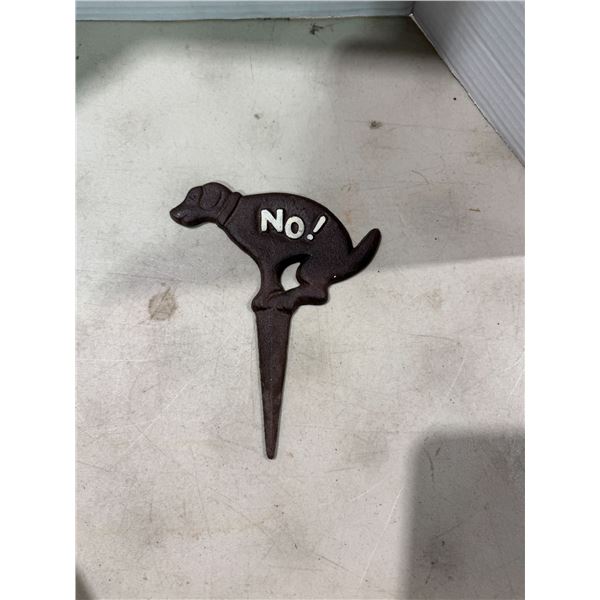 No pooping garden stake