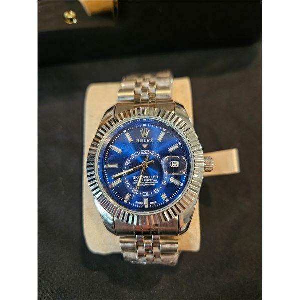 Rolex branded watch with metal band