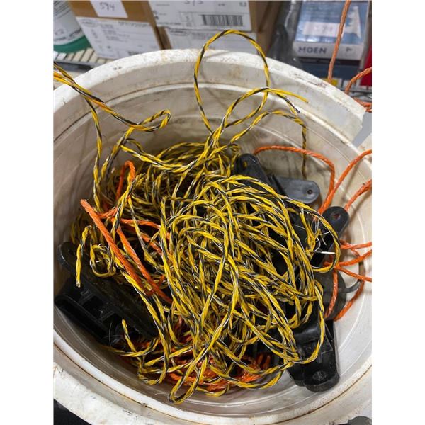 PAIL OF FENCING SUPPLIES