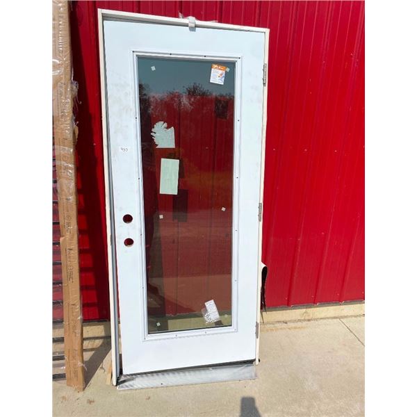 34IN EXTERIOR DOOR - FRAME BUSTED - SMALL DENT ON CORNER