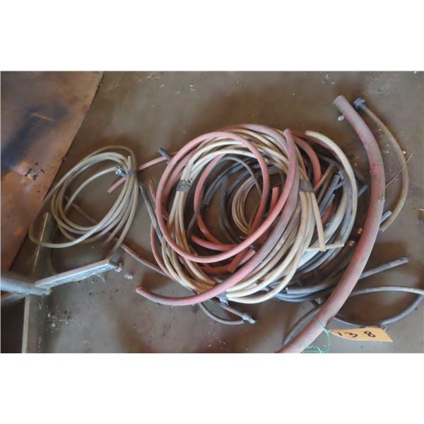 Various Lengths and Variety of Pipes, Tubing, and Hoses