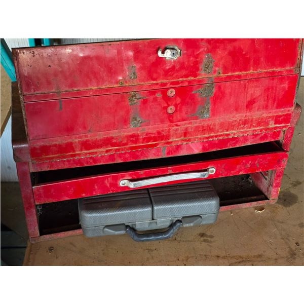Red tool chest with 2 Cat D7 Wrenches and empty tool case