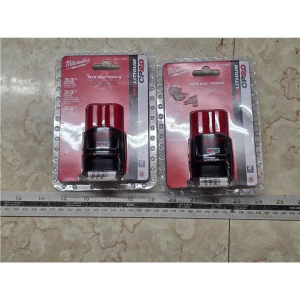 2 new red lithium milwaukee batteries