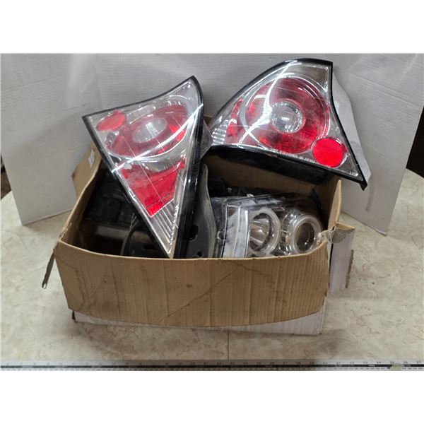 Vehicle headlights and tail lights- unknown for what vehicle