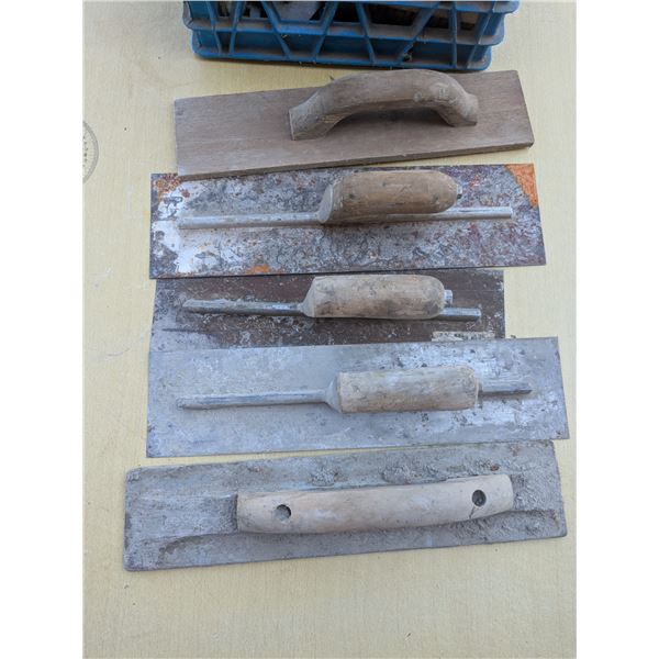 Milk crate of various trowels