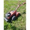 Image 1 : MTD rear tine tiller - self-propelled, 5HP Briggs & Stratton, has compression