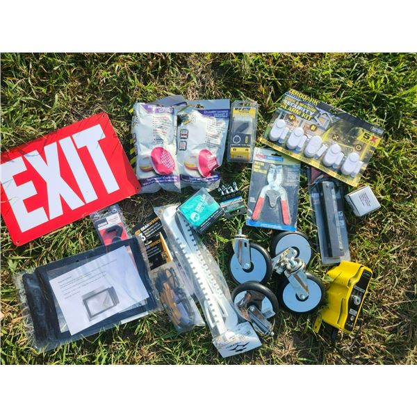box of misc. - exit sign, casters, hockey skate covers, etc.