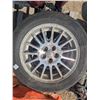 Image 1 : Set of 4 tires and rims, Chrysler, 5 bolt, R16, low tread