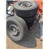 Image 1 : set of tires on rims, 6 bolt, R17, two very bald, other 2 low tread