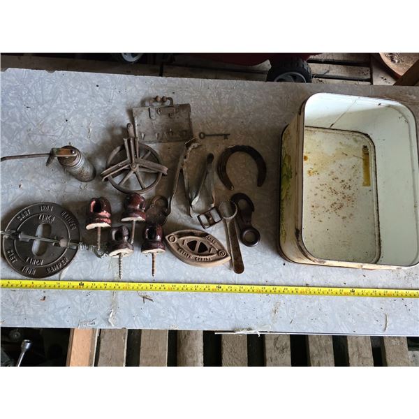 Antique tools, pullies, sad iron, oiler, insulators