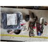 Image 1 : Assortment of items, chainsaw blade, light, jeans