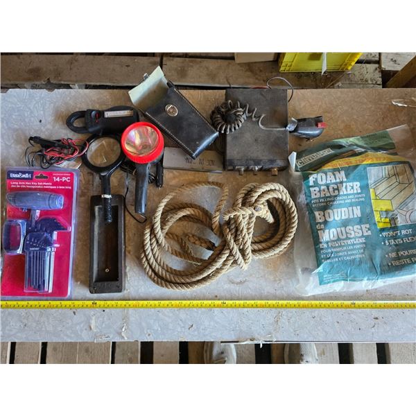 Assortment of items, hex key set, rope, sharpening stone