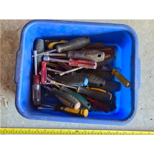 Bin of various screw drivers