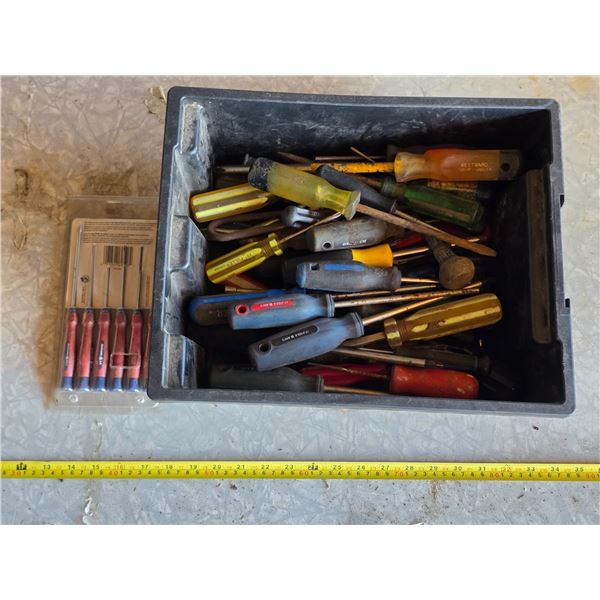 Bin of various screw drivers