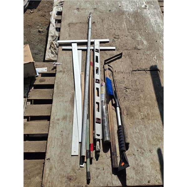 Assortment of tools- level, measuring sticks