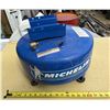 Image 1 : Blue Michelin-branded air compressor tank featuring the Michelin Man logo. (Untested)