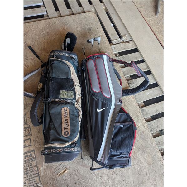 2 golf bags with clubs