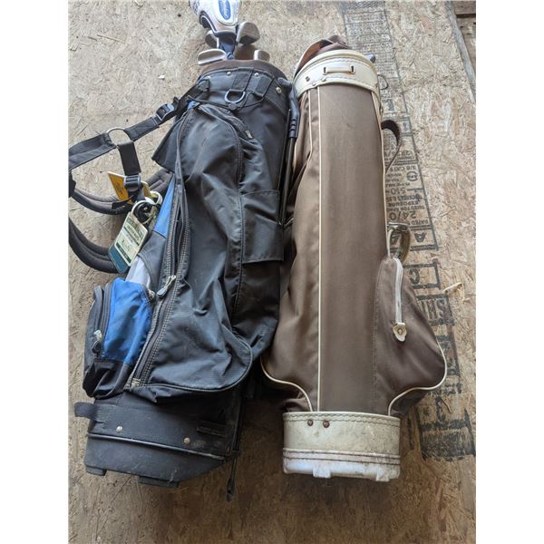 2 golf bags with clubs