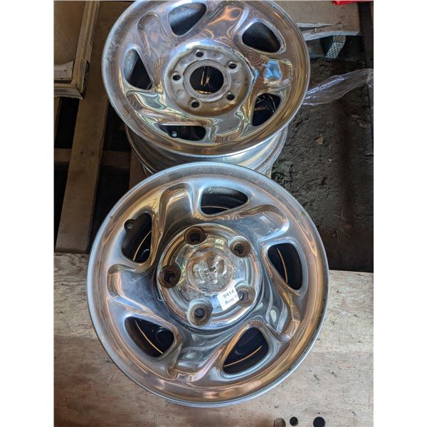 4 chrome rims. R16, 5 bolt dodge, with hub caps