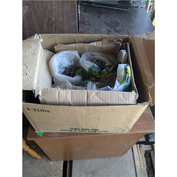 Assorted nails and screws, sorted into bags