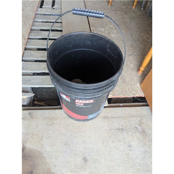 Pail of assorted pulleys +