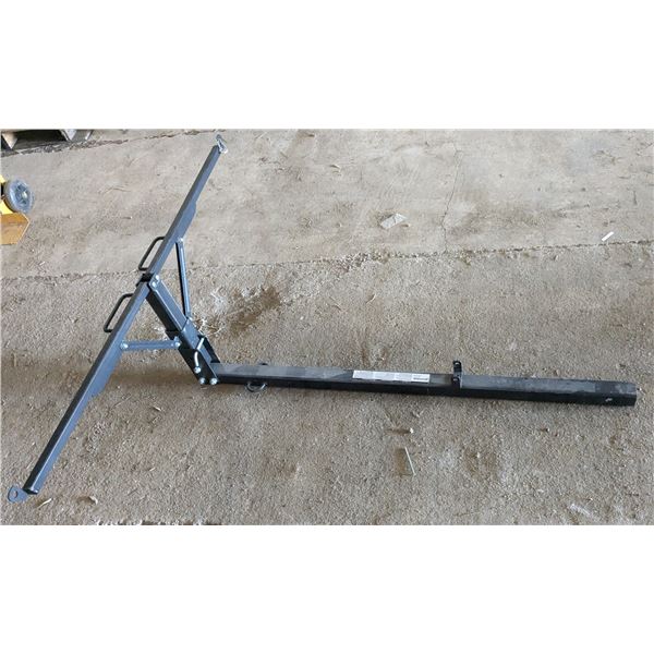 Folding hitch mount truck bed extension for hauling boats and long material