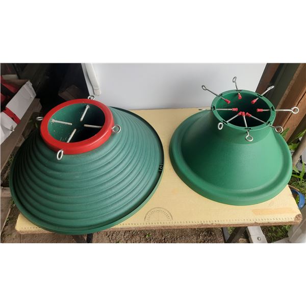 Vintage-style green and red hard plastic Christmas tree stand.