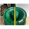 Image 5 : Vintage-style green and red hard plastic Christmas tree stand.