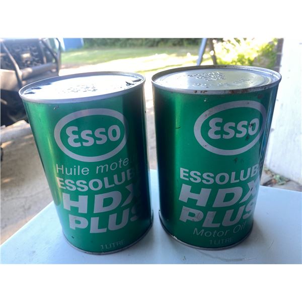 Two Esso oil cans