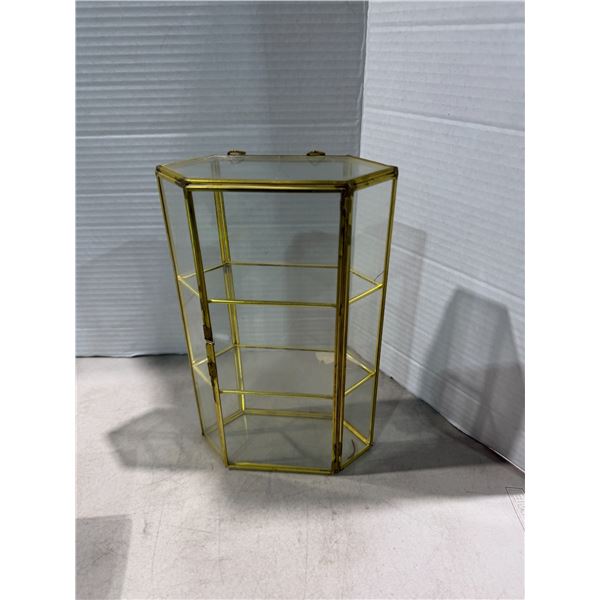 Small wall hanging display stand has cracked in top glass
