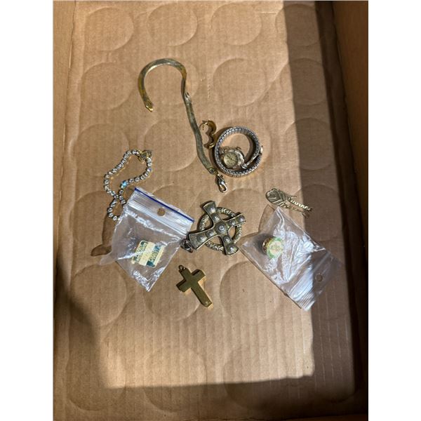 Assorted bracelets and jewelry and pins