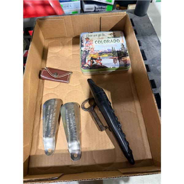 Advertising shoehorns and tin