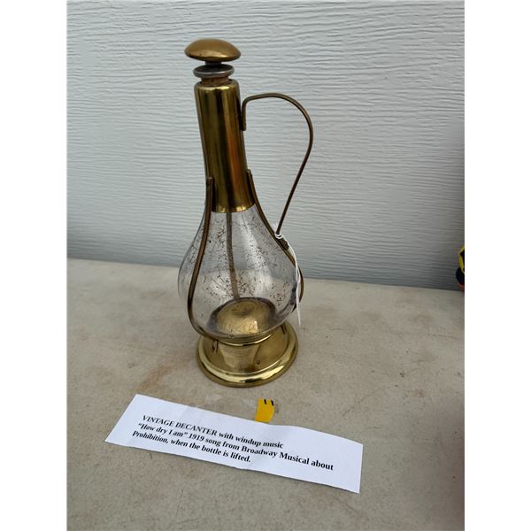 Vintage decanter with wind up music how dry I am