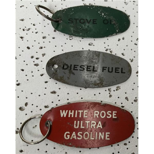 Three White Rose Storage Tank Tags