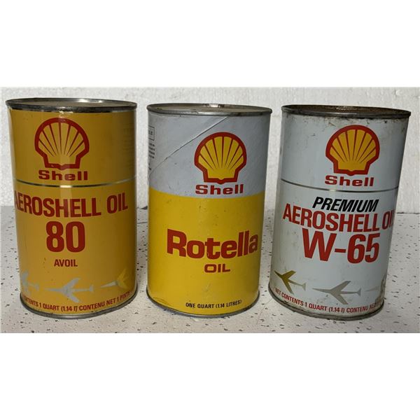 hree Shell Oil Quarts. Two Full